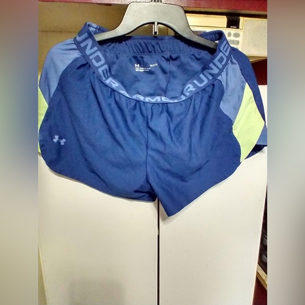 blue and green under armour shorts. L